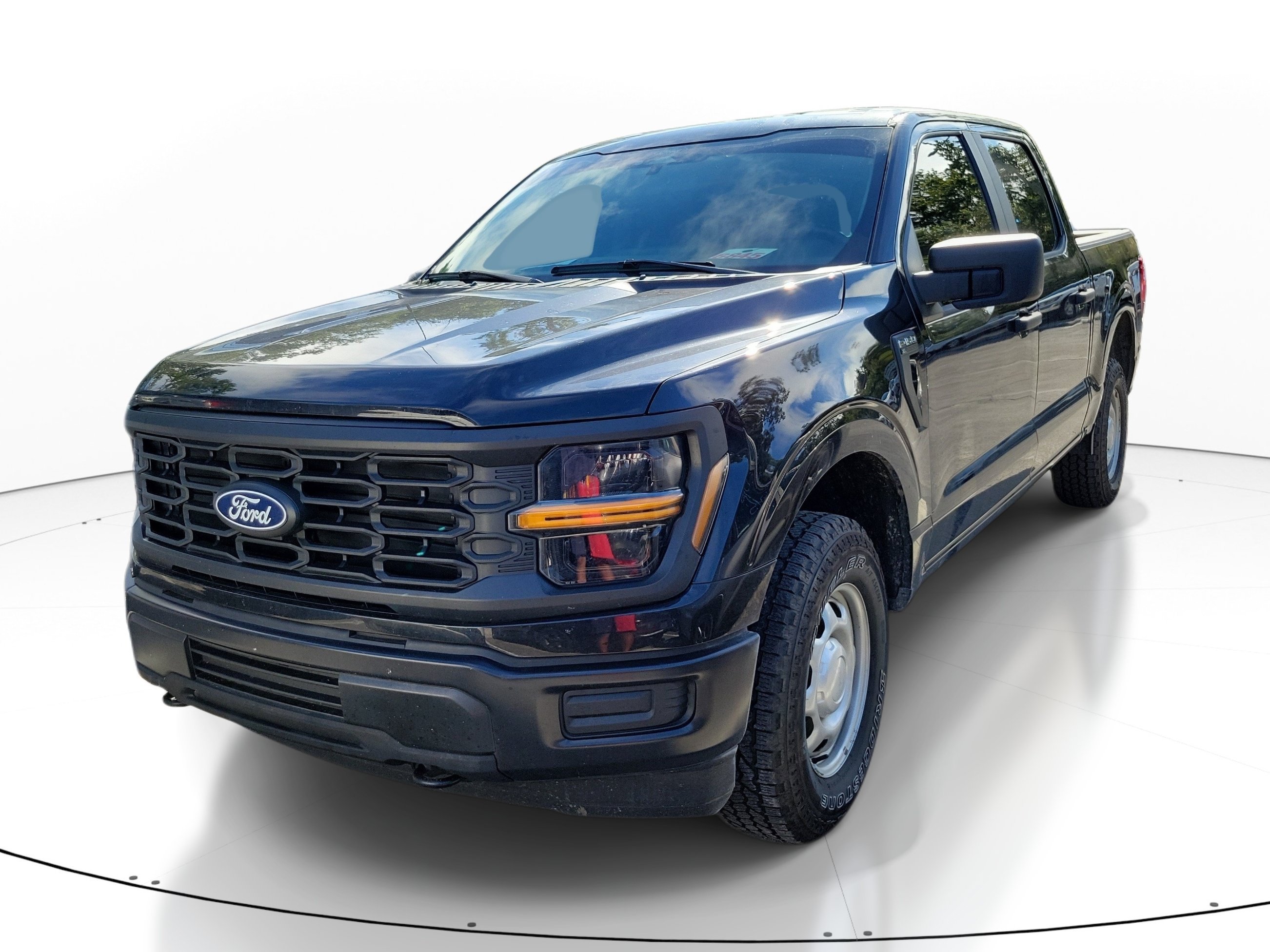 Used 2025 Black Metallic Ford XL image 1