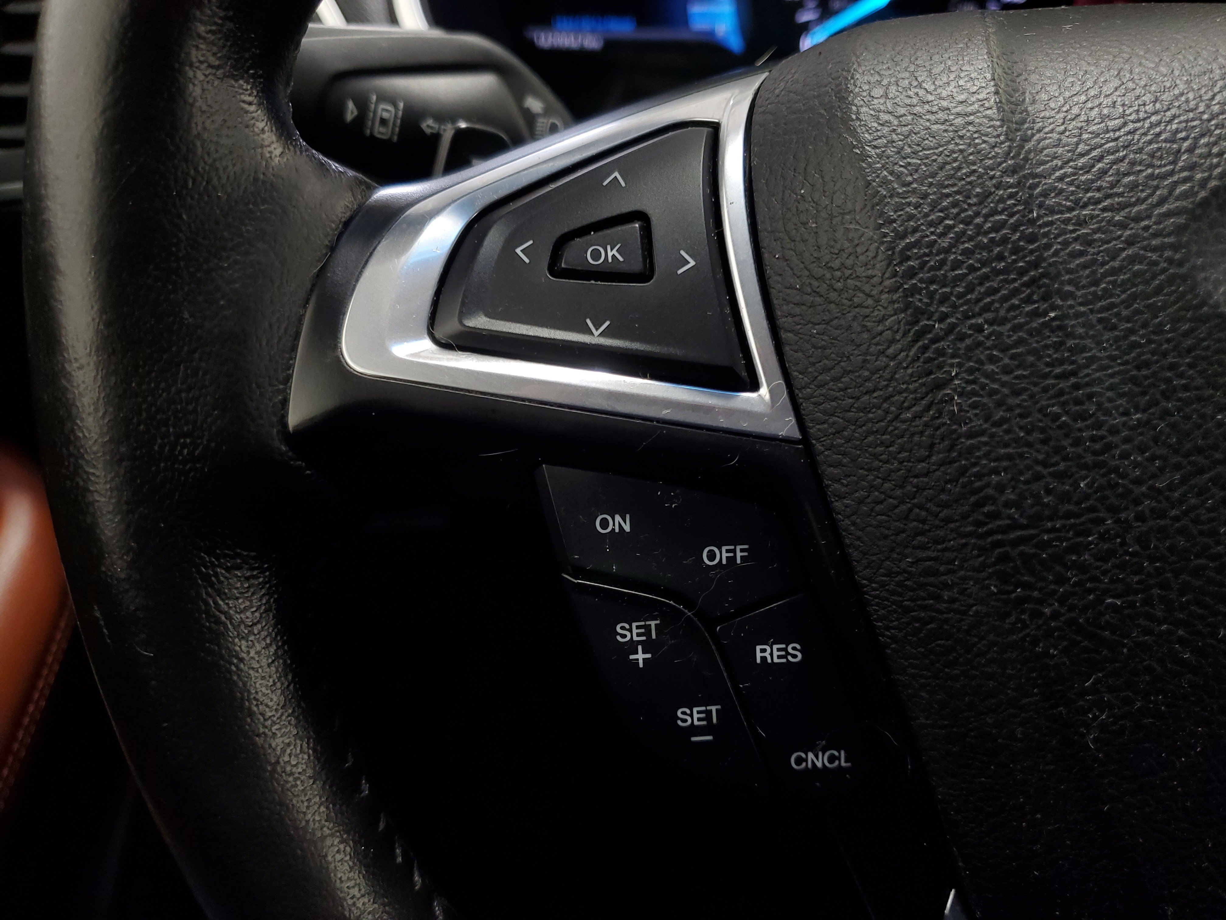 Used 2015 Magnetic Metallic Ford Titanium image 29