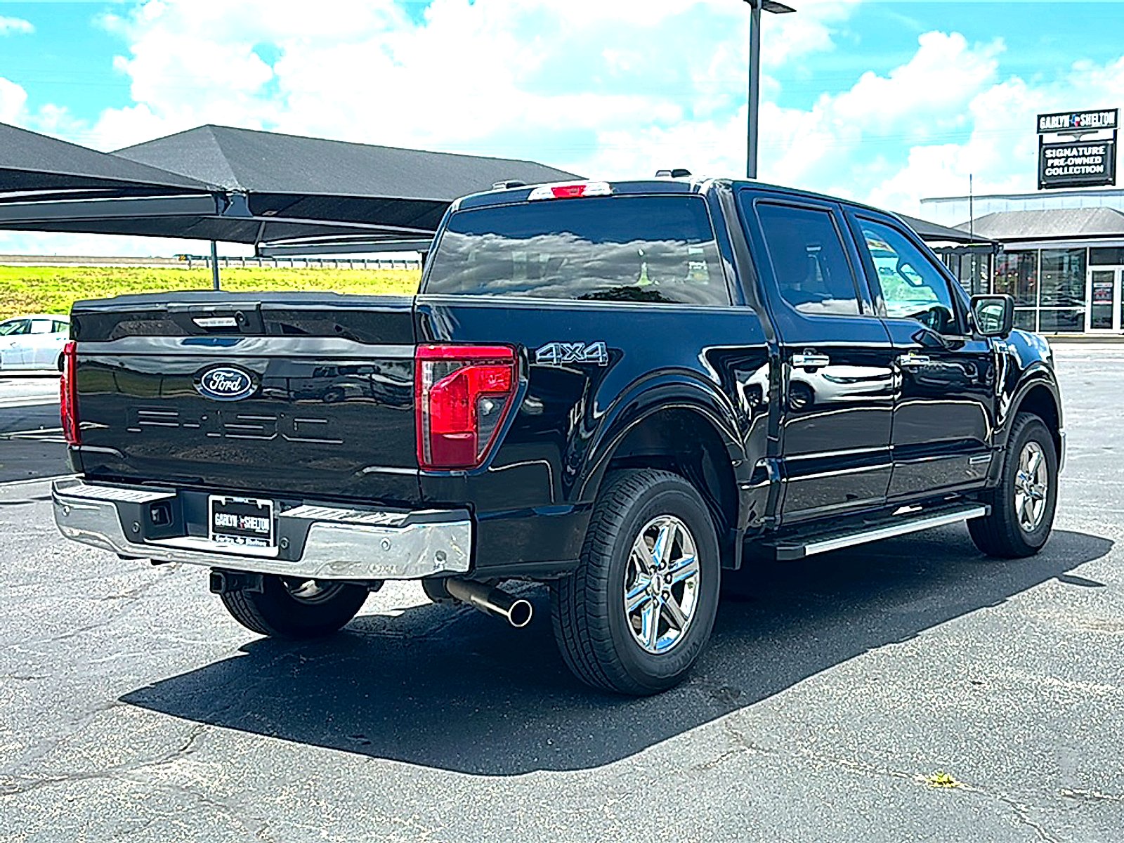 Used 2024 Agate Black Metallic Ford XLT image 8