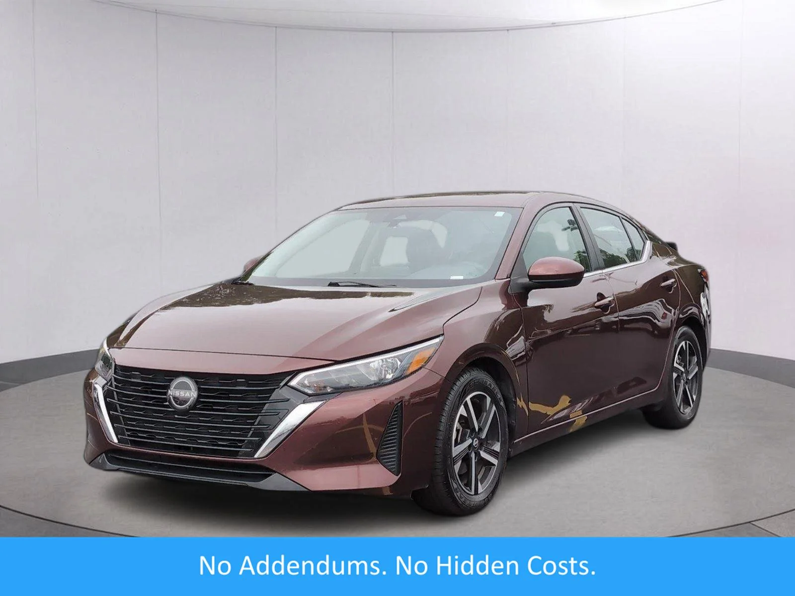 Used 2024 Rosewood Metallic Nissan SV image 1