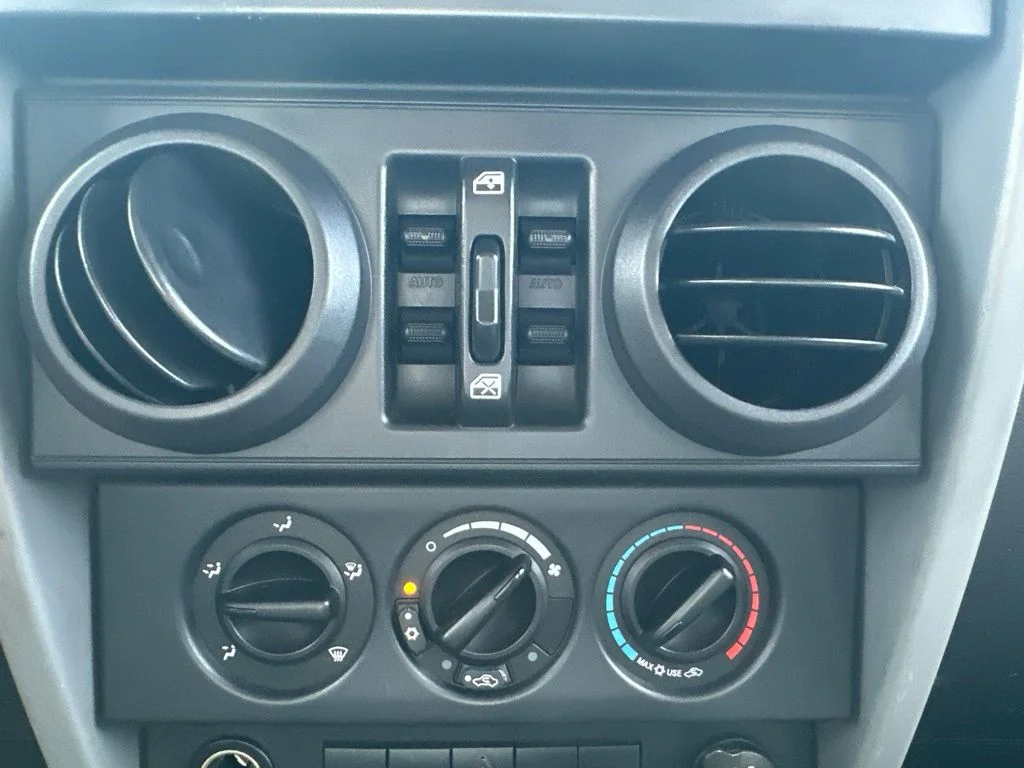 Used 2009 Orange Jeep Unlimited X image 30