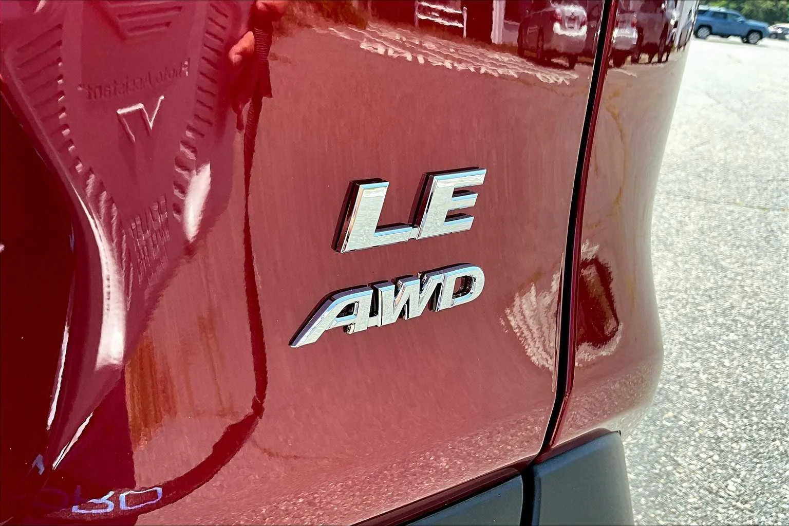 Certified Used 2025 Ruby Flare Pearl Toyota LE image 7