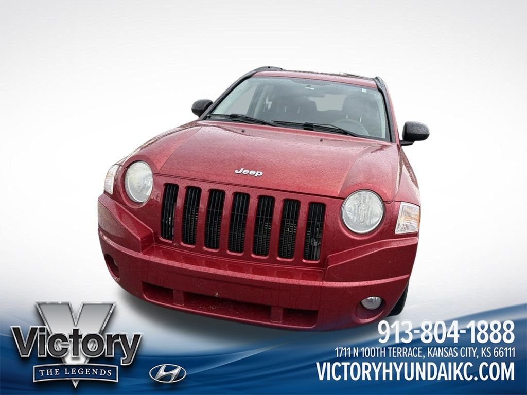 Used 2010 Red Jeep Sport image 2