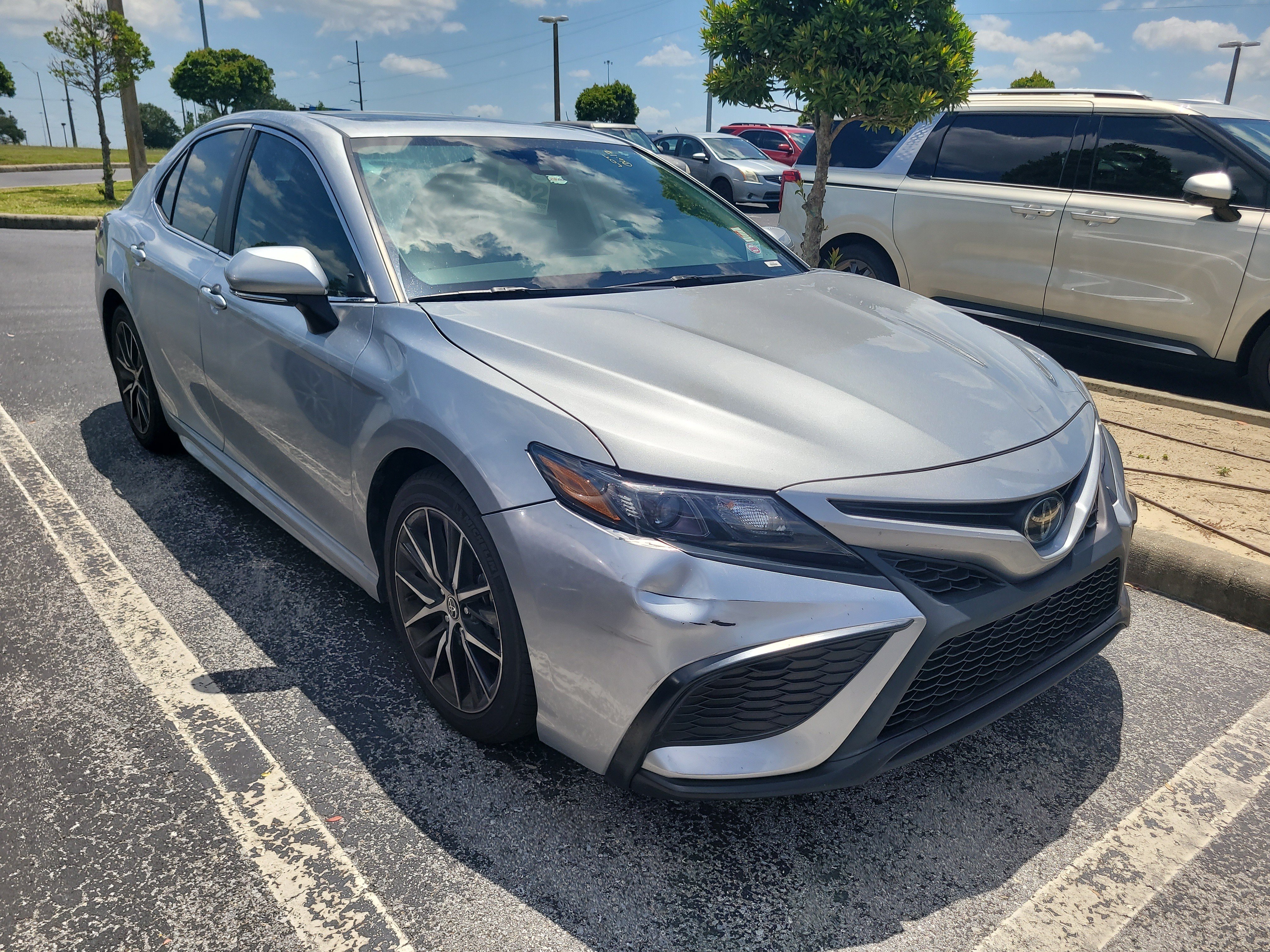 Used 2024 Celestial Silver Metallic Toyota SE image 1