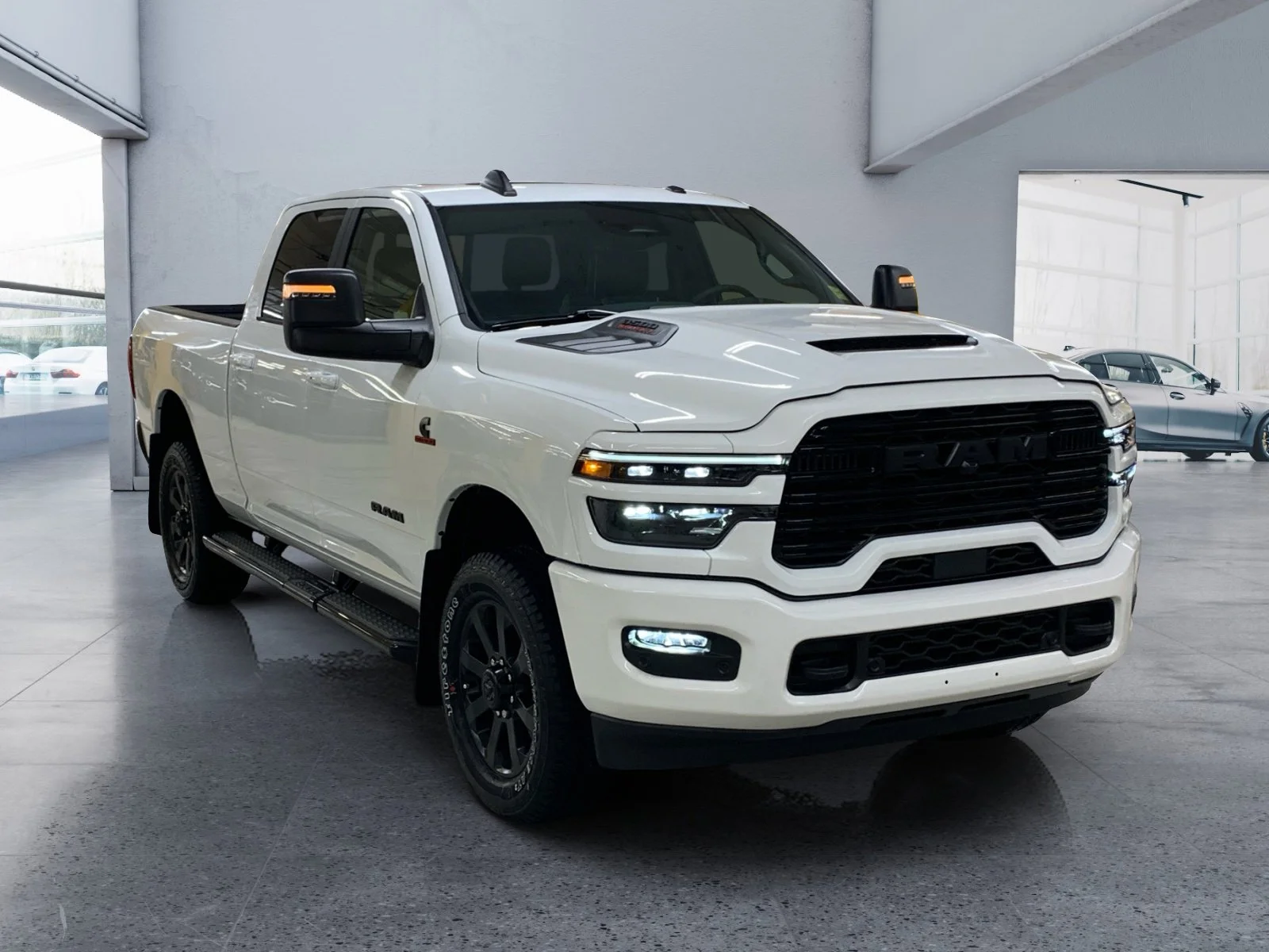 New 2026 Bright White Ram Laramie image 7