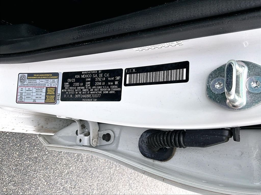Used 2024 Snow White Pearl Kia LXS image 29