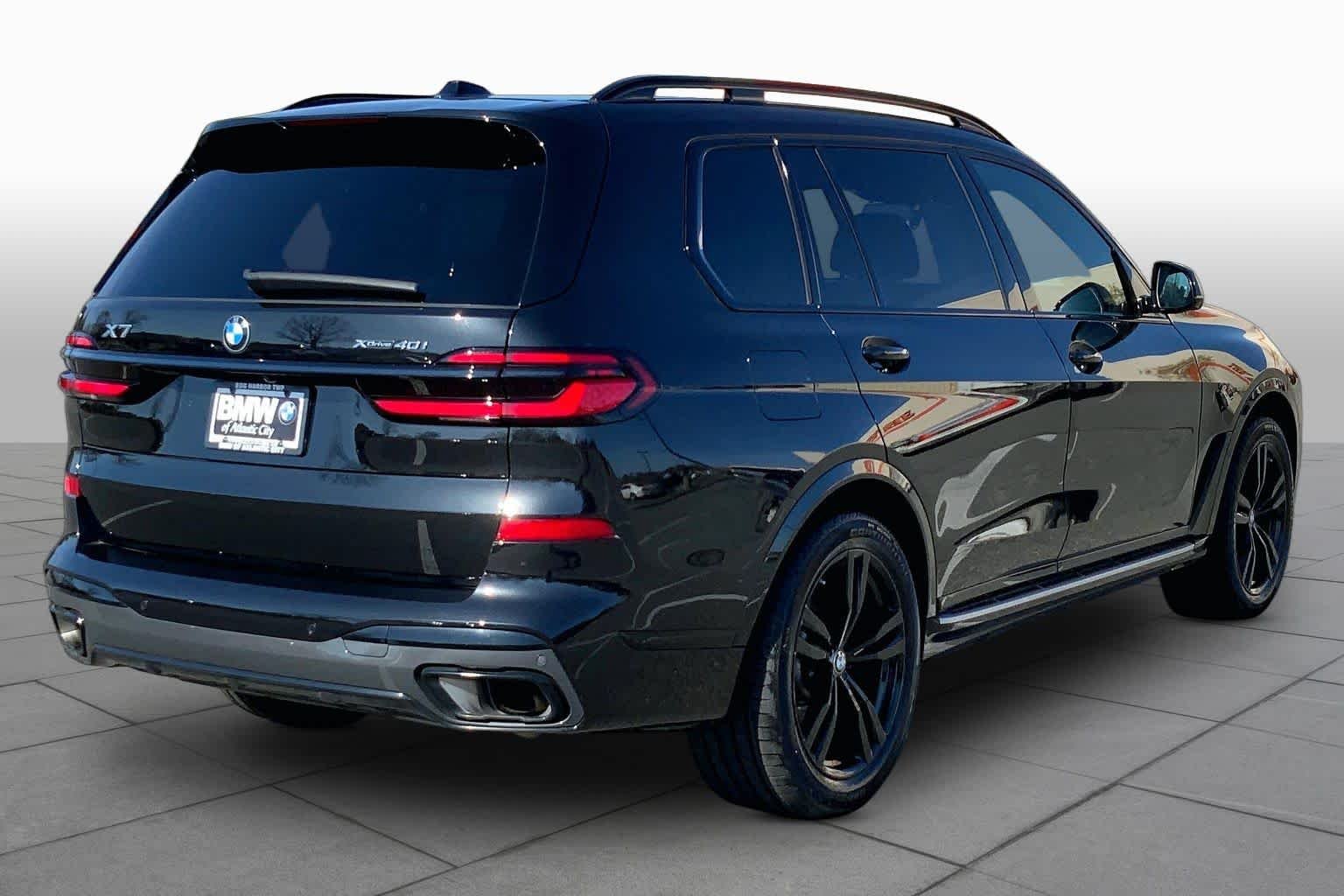 Certified Used 2024 Black Sapphire Metallic BMW xDrive40i image 12