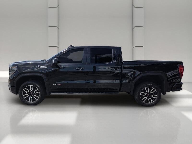 Used 2025 Onyx Black GMC 4WD CREW CAB 147" AT4 image 2