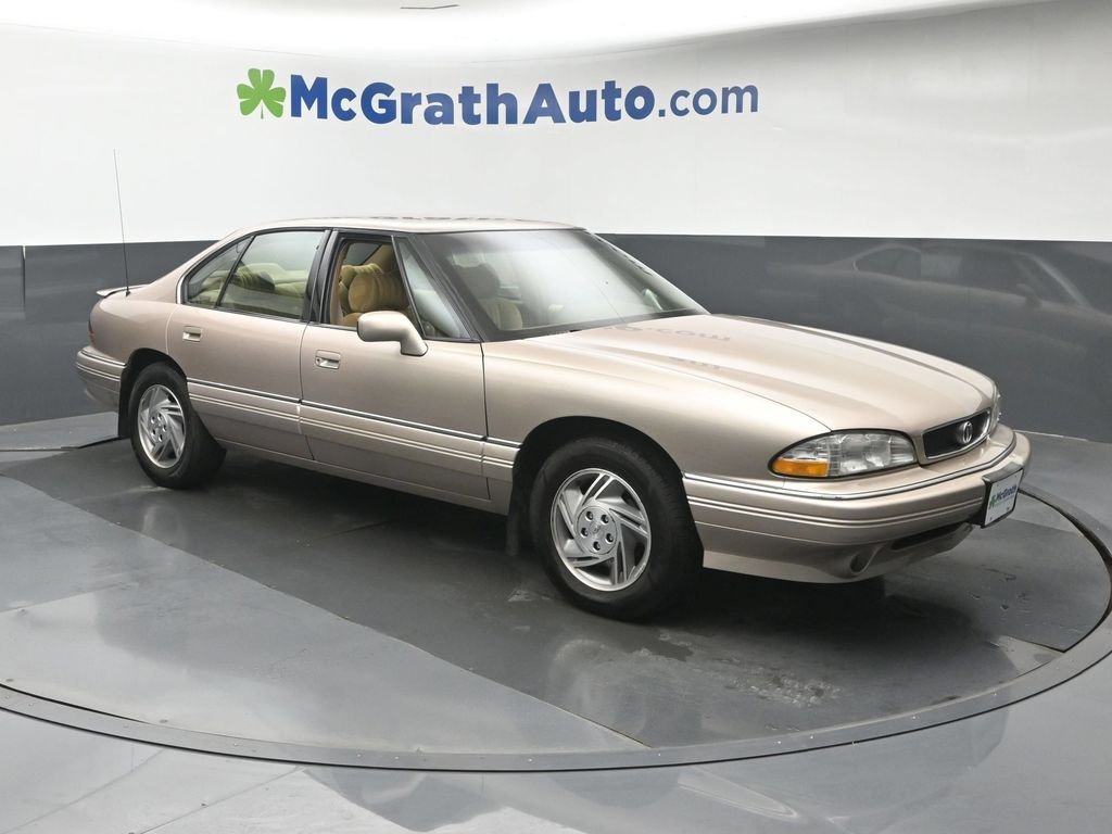 Used 1995 Beige Pontiac SE image 2