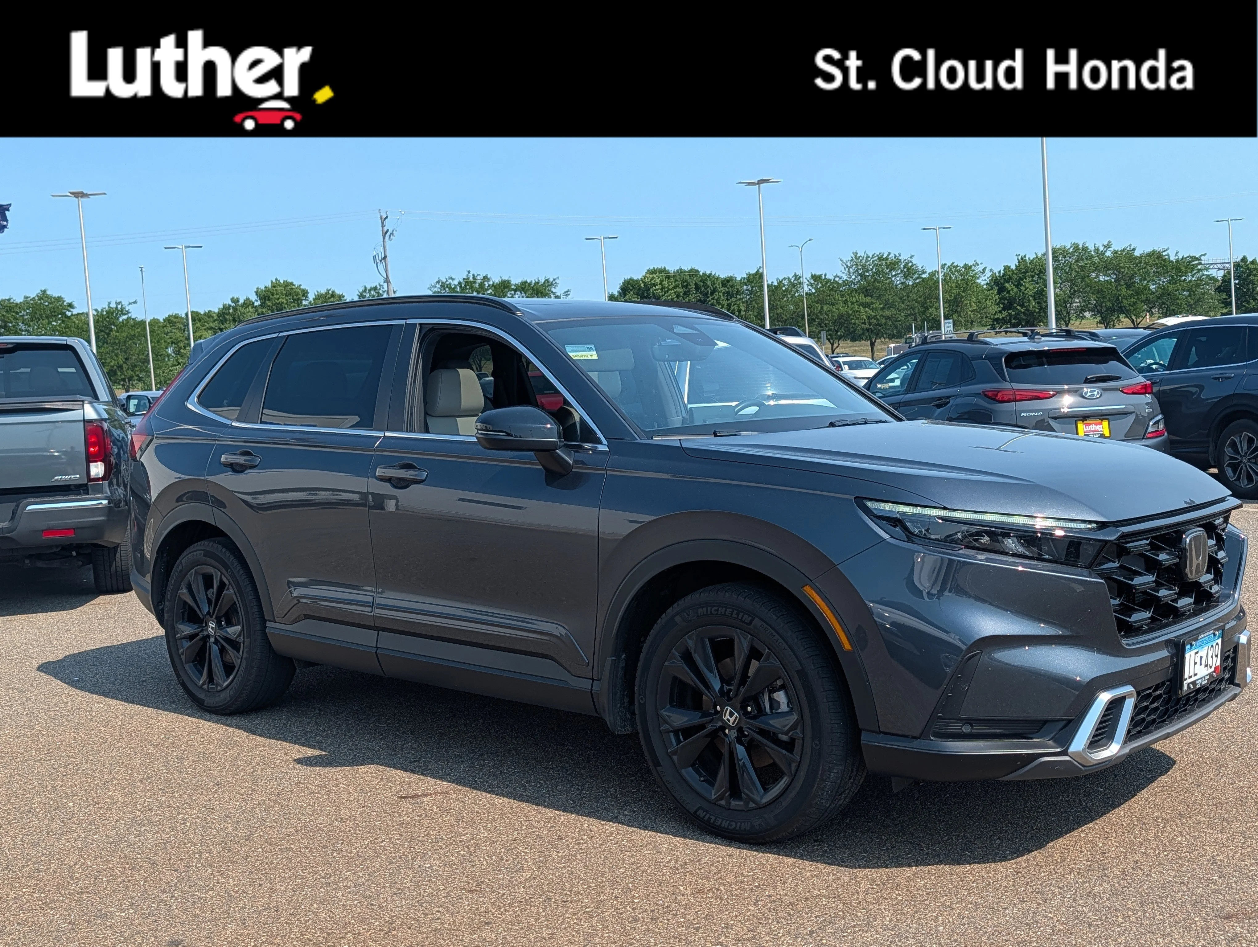 Used 2024 Meteorite Gray Metallic Honda Sport Touring image 1