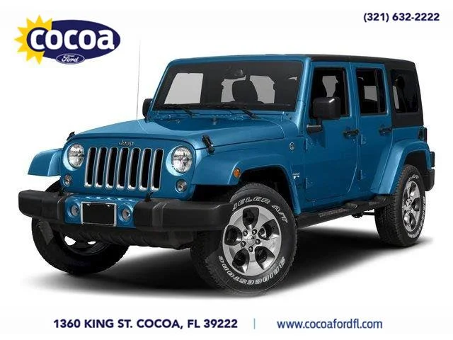 Used 2016 White Jeep Sahara image 1