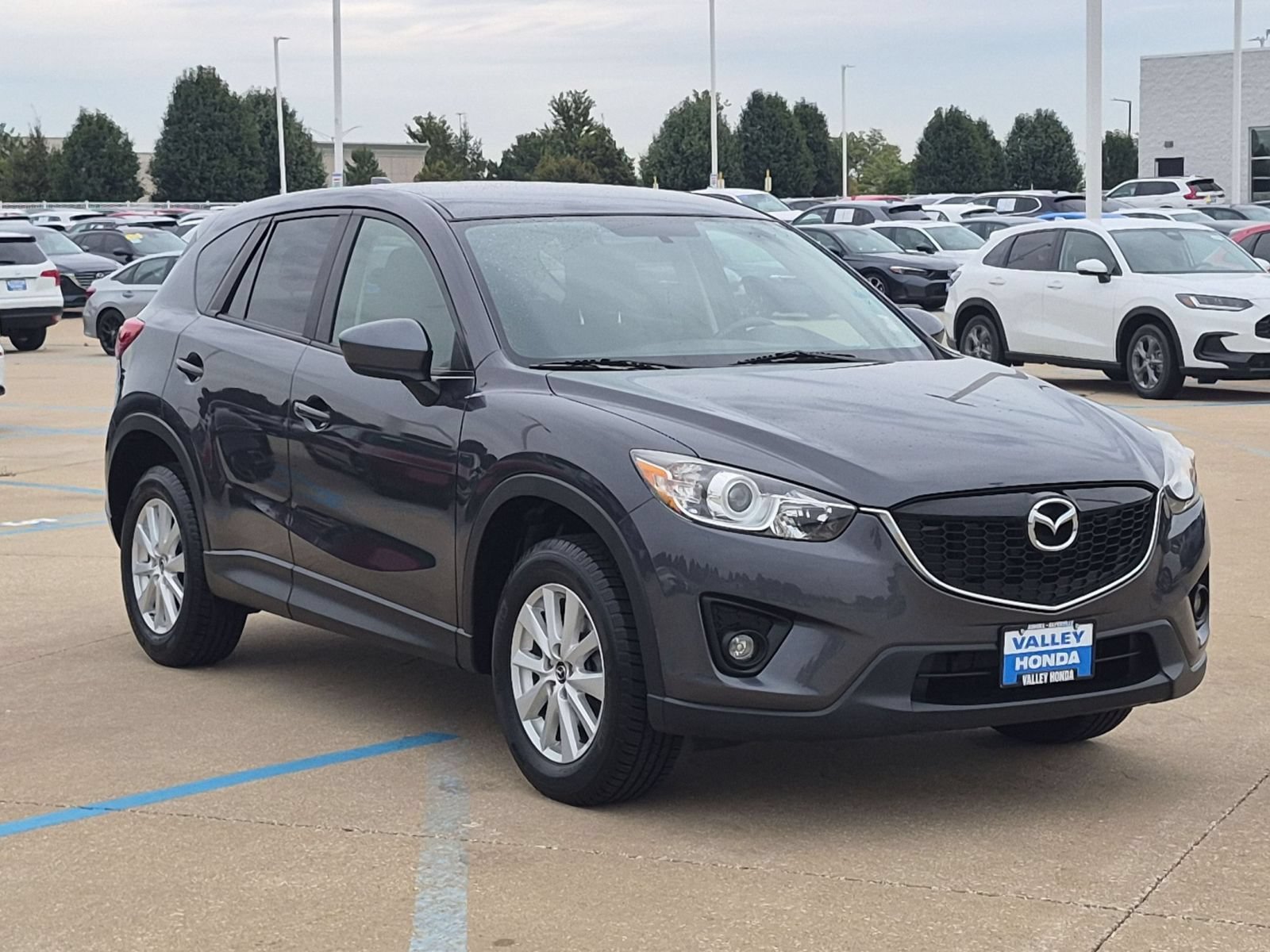 Used 2014 Meteor Gray Mica Mazda Touring AWD image 4