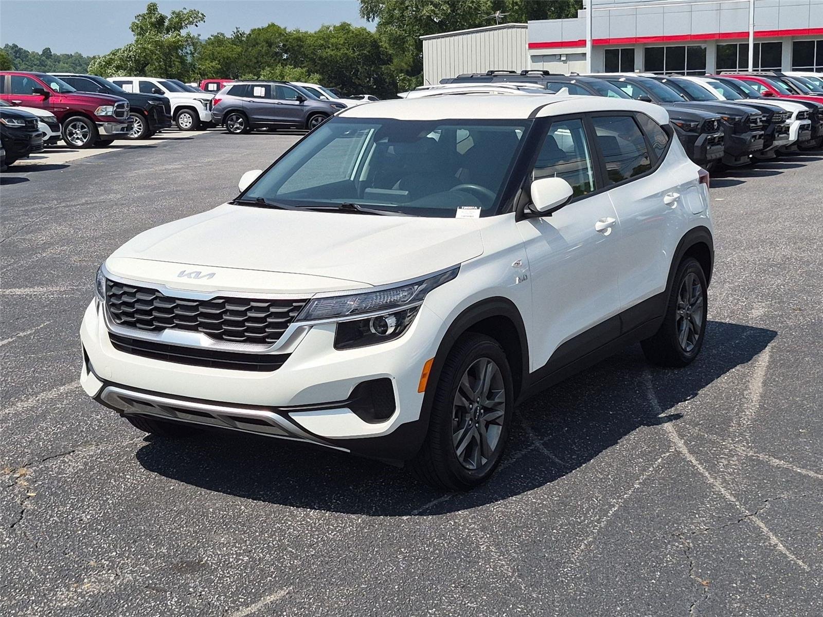 Used 2023 Snow White Pearl Kia LX image 1