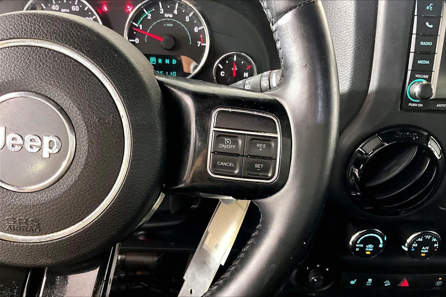 Used 2014 Black Clearcoat Jeep Altitude image 23