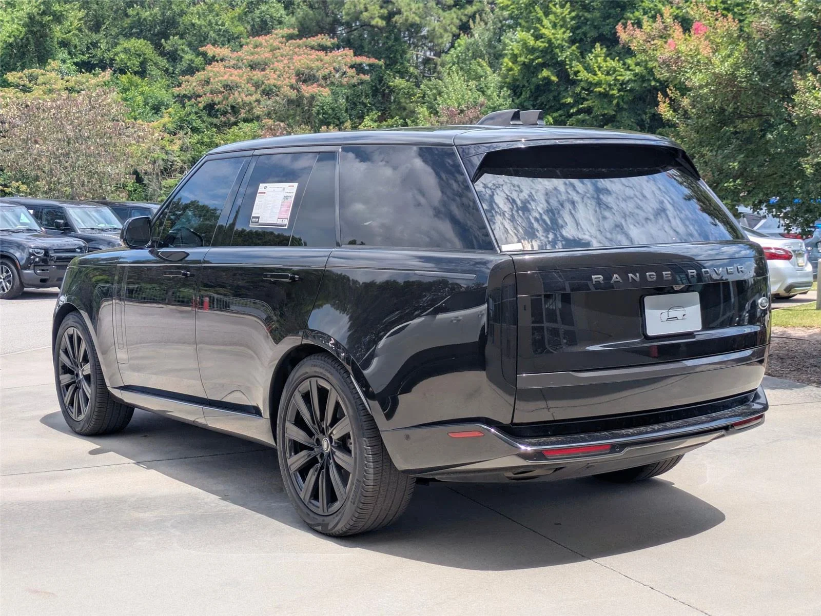 Used 2023 Santorini Black Metallic Land Rover SE image 7