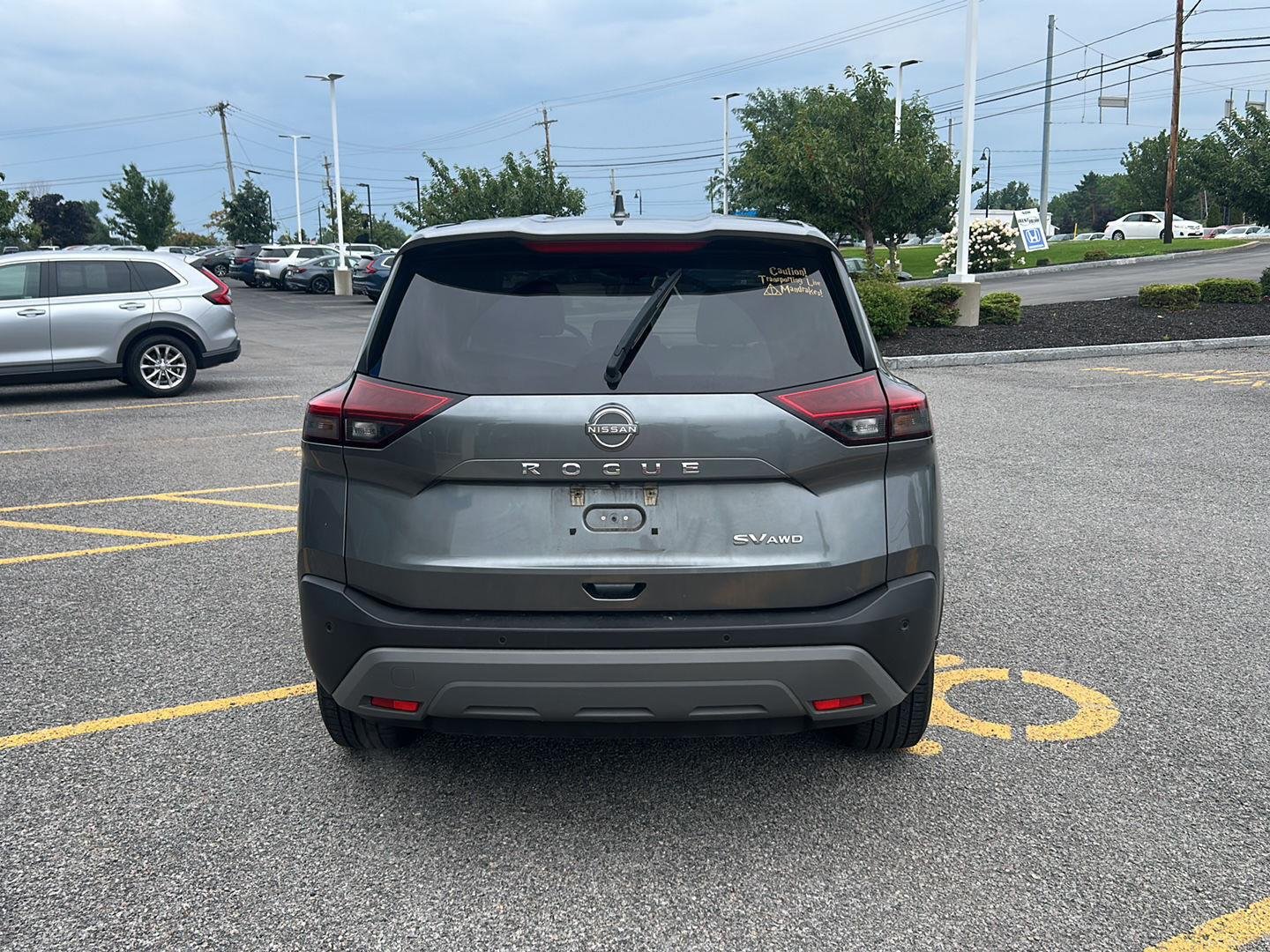 Used 2023 Gun Metallic Nissan SV image 5