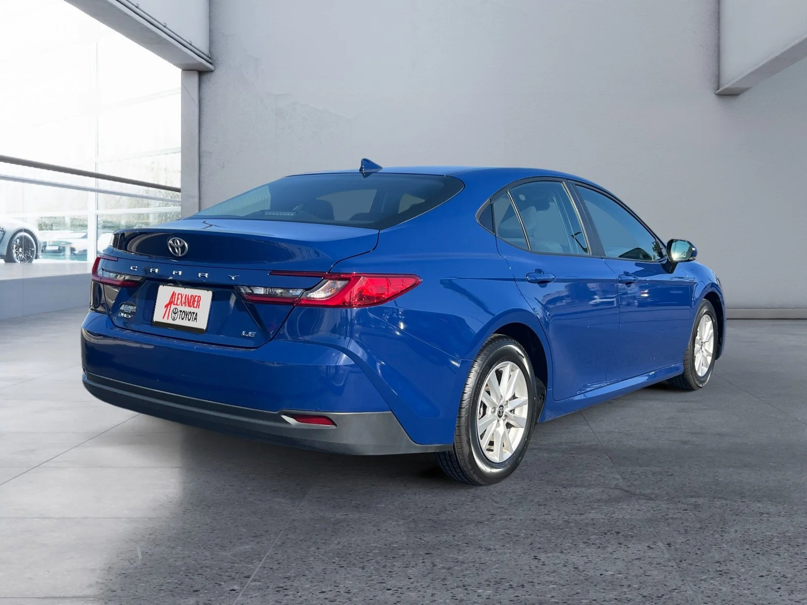 Used 2025 Reservoir Blue Toyota LE image 5