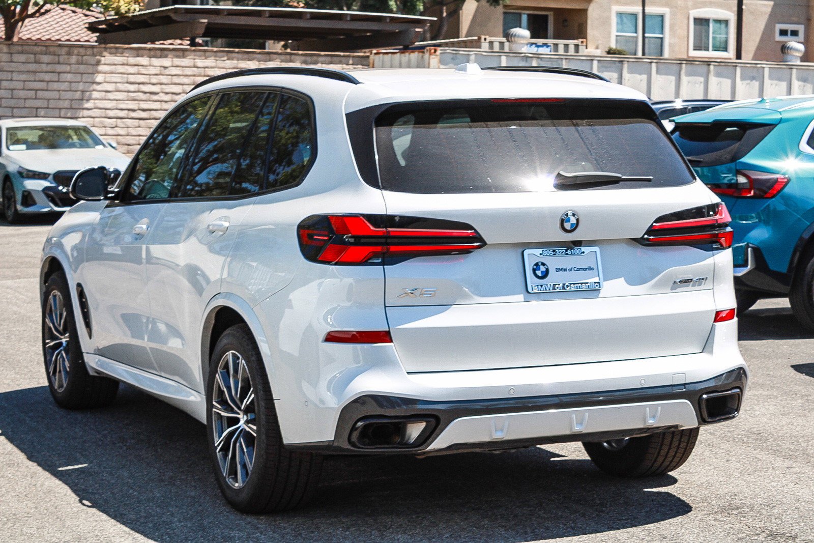Used 2024 Mineral White Metallic BMW xDrive40i image 4