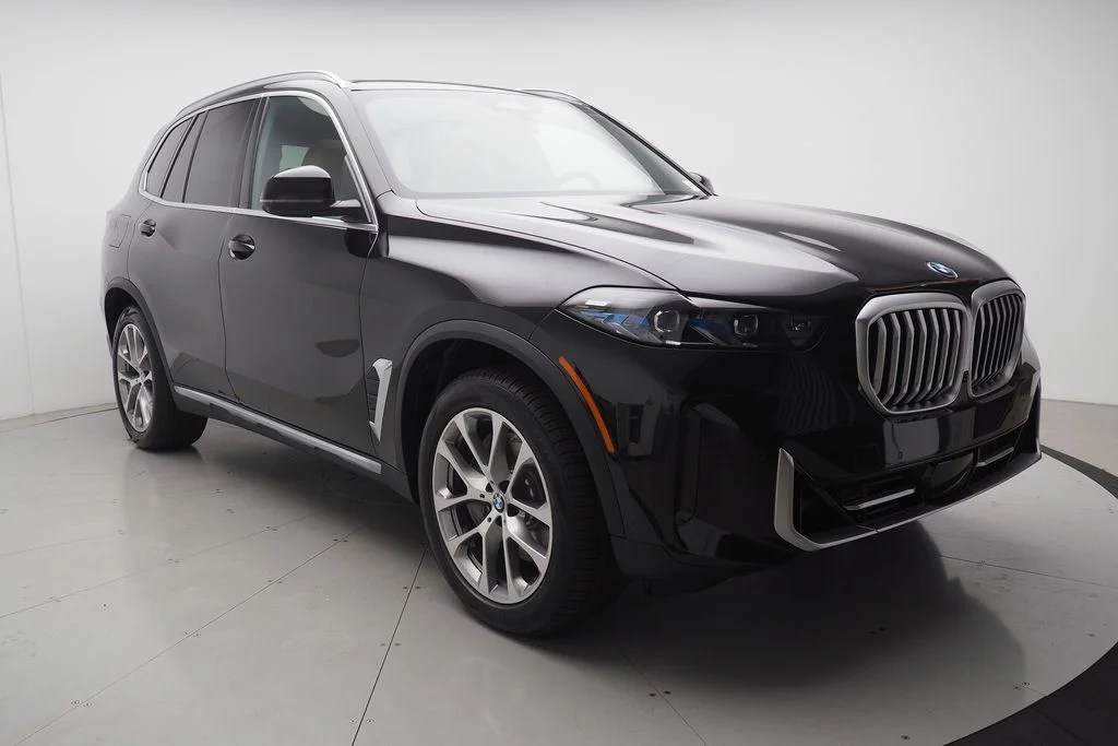New 2026 Black Sapphire Metallic BMW xDrive50e image 2