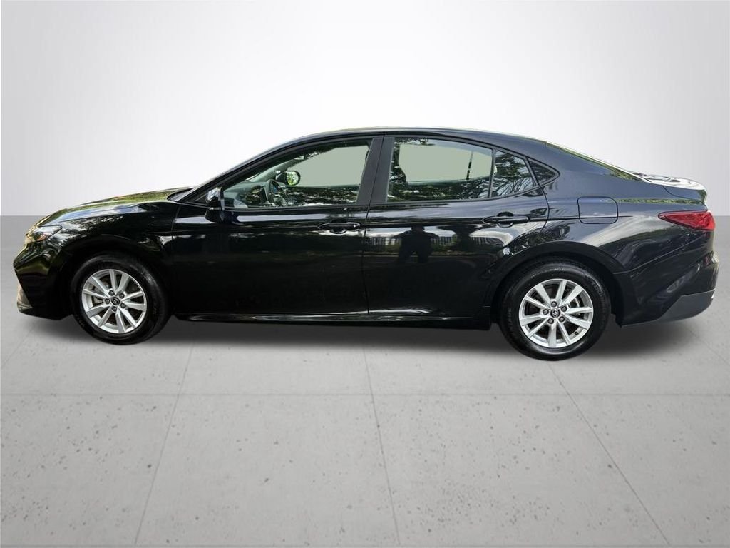 Used 2025 Midnight Black Metallic Toyota LE image 9