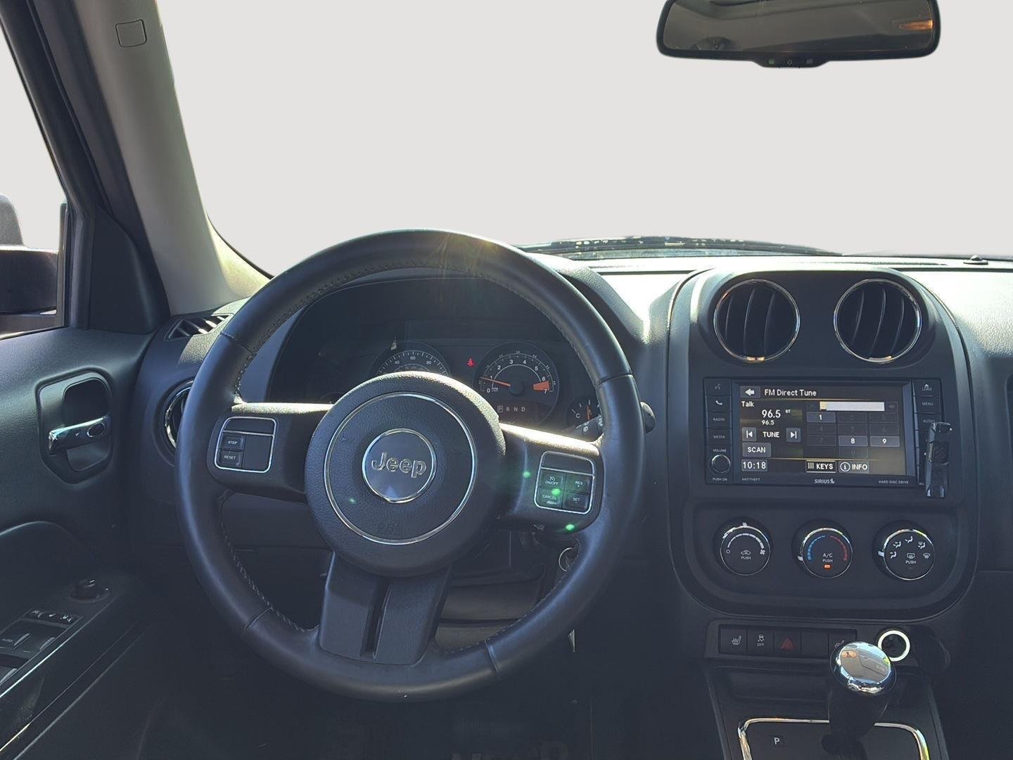 Used 2016 Black Clearcoat Jeep High Altitude Edition image 5