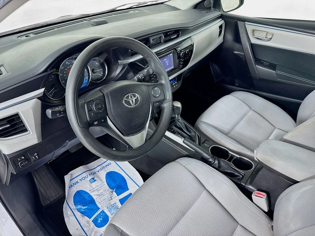 Used 2015 Super White Toyota LE image 10