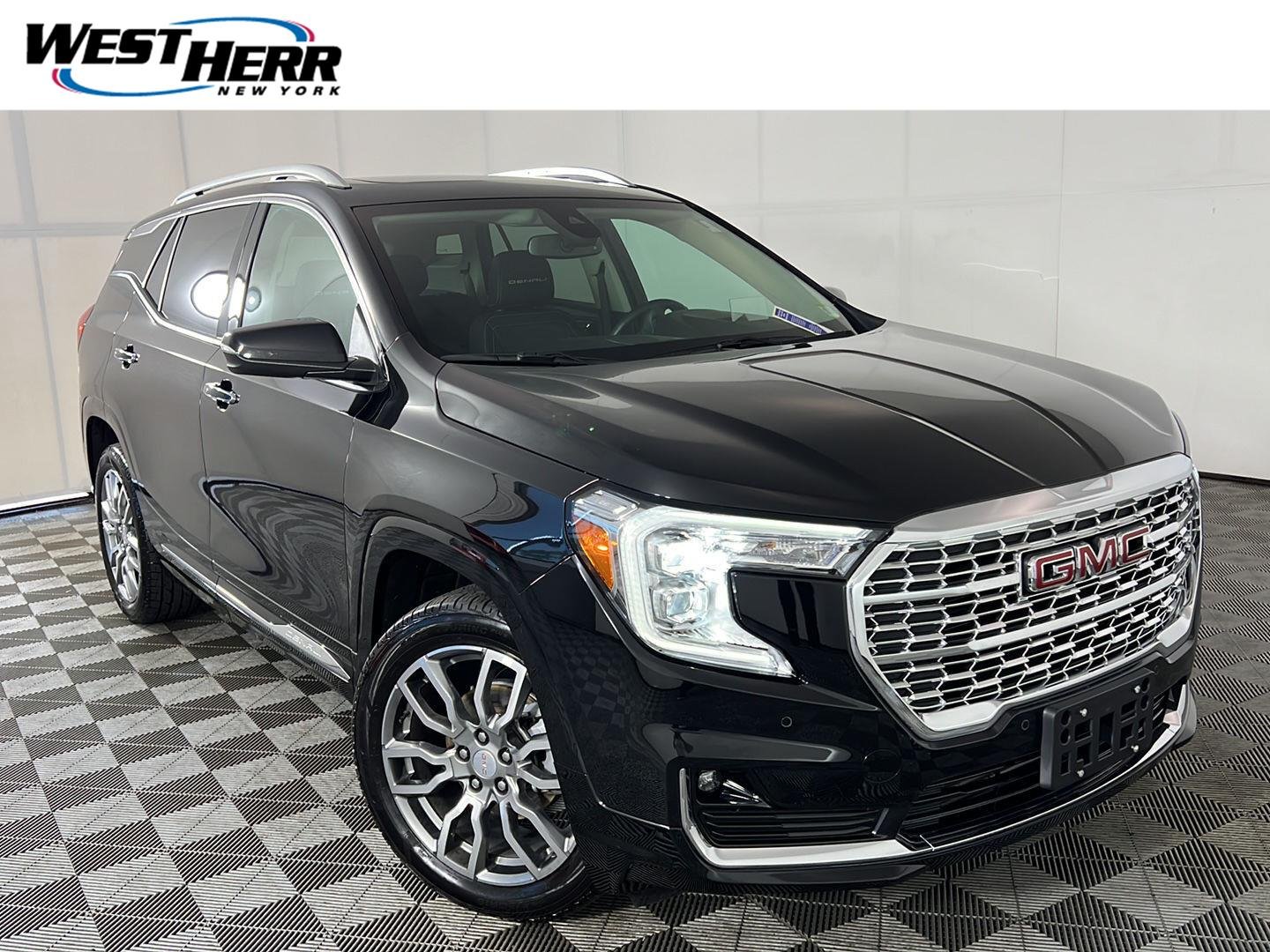 Used 2023 Ebony Twilight Metallic GMC Denali image 1