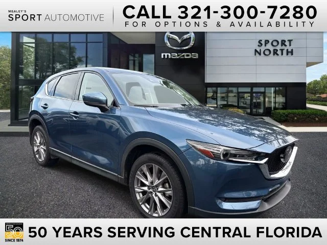Used 2019 Blue Mazda Grand Touring image 1