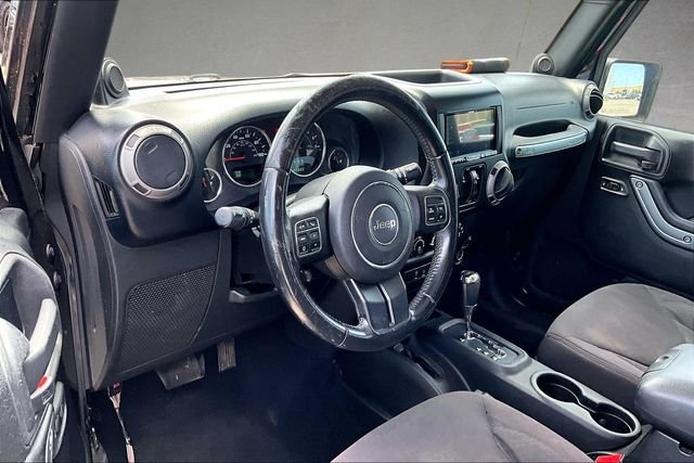 Used 2013 Black Clearcoat Jeep Unlimited Sport image 9