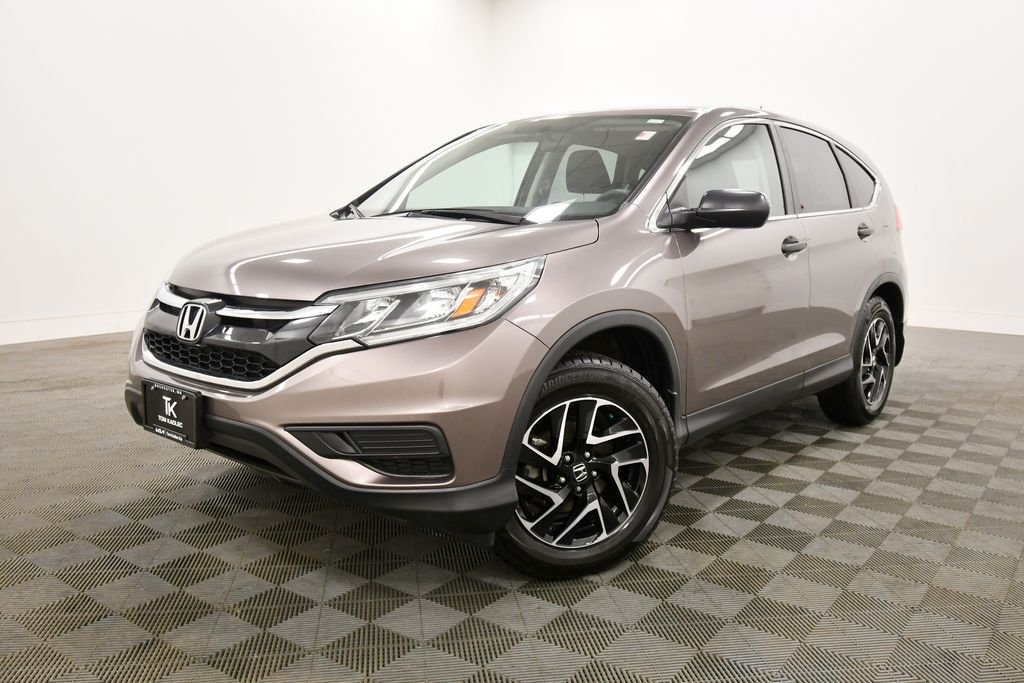 Used 2016 Honda CR-V SE with VIN 5J6RM4H48GL047452 for sale in Rochester, Minnesota