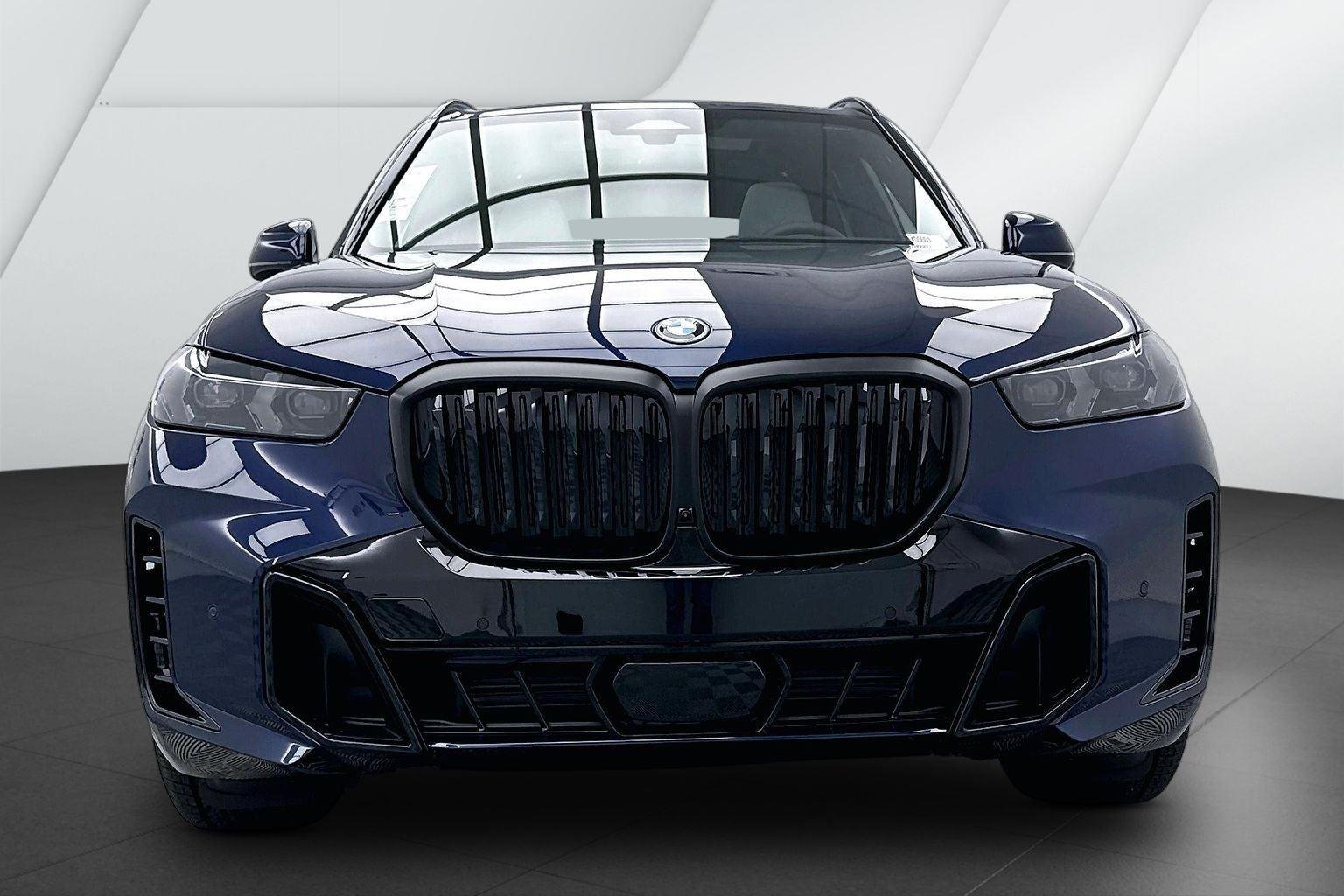 New 2026 Tanzanite Blue II Metallic BMW xDrive50e image 2