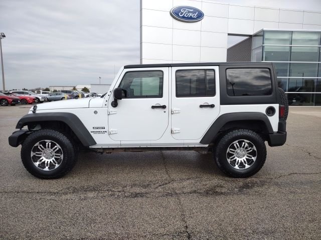 Used 2016 Jeep Wrangler Unlimited Sport S with VIN 1C4BJWDG7GL129541 for sale in Galesburg, IL