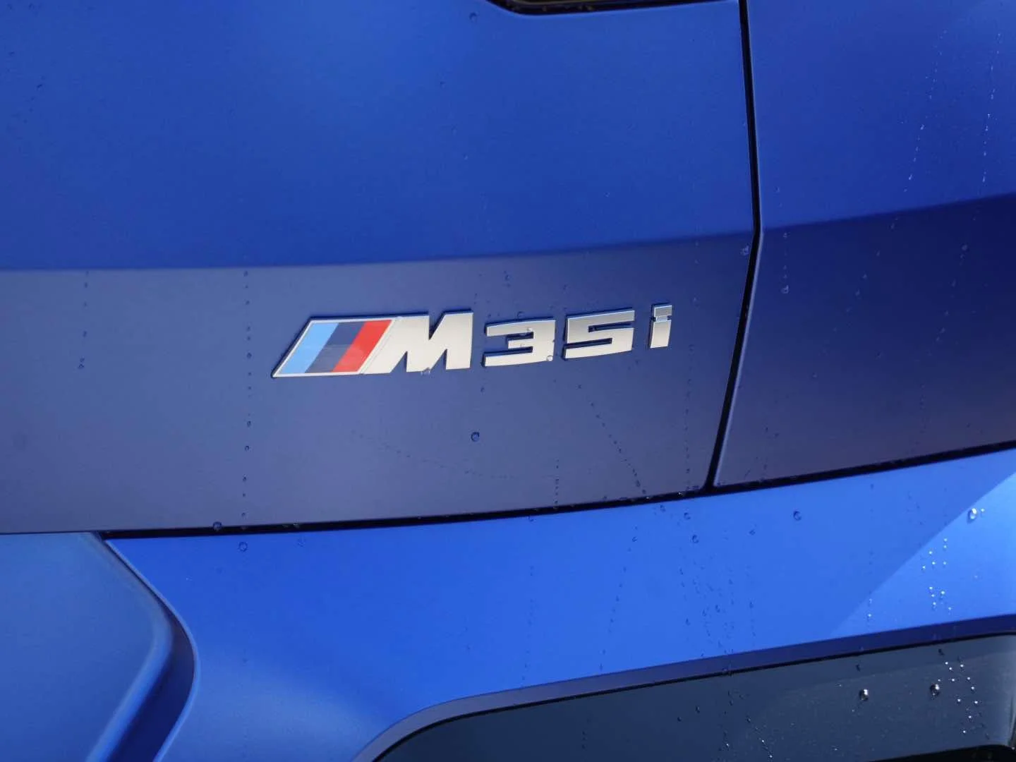 Used 2024 Frozen Portimao Blue II Metallic BMW M35i Sports Activity Coupe image 5