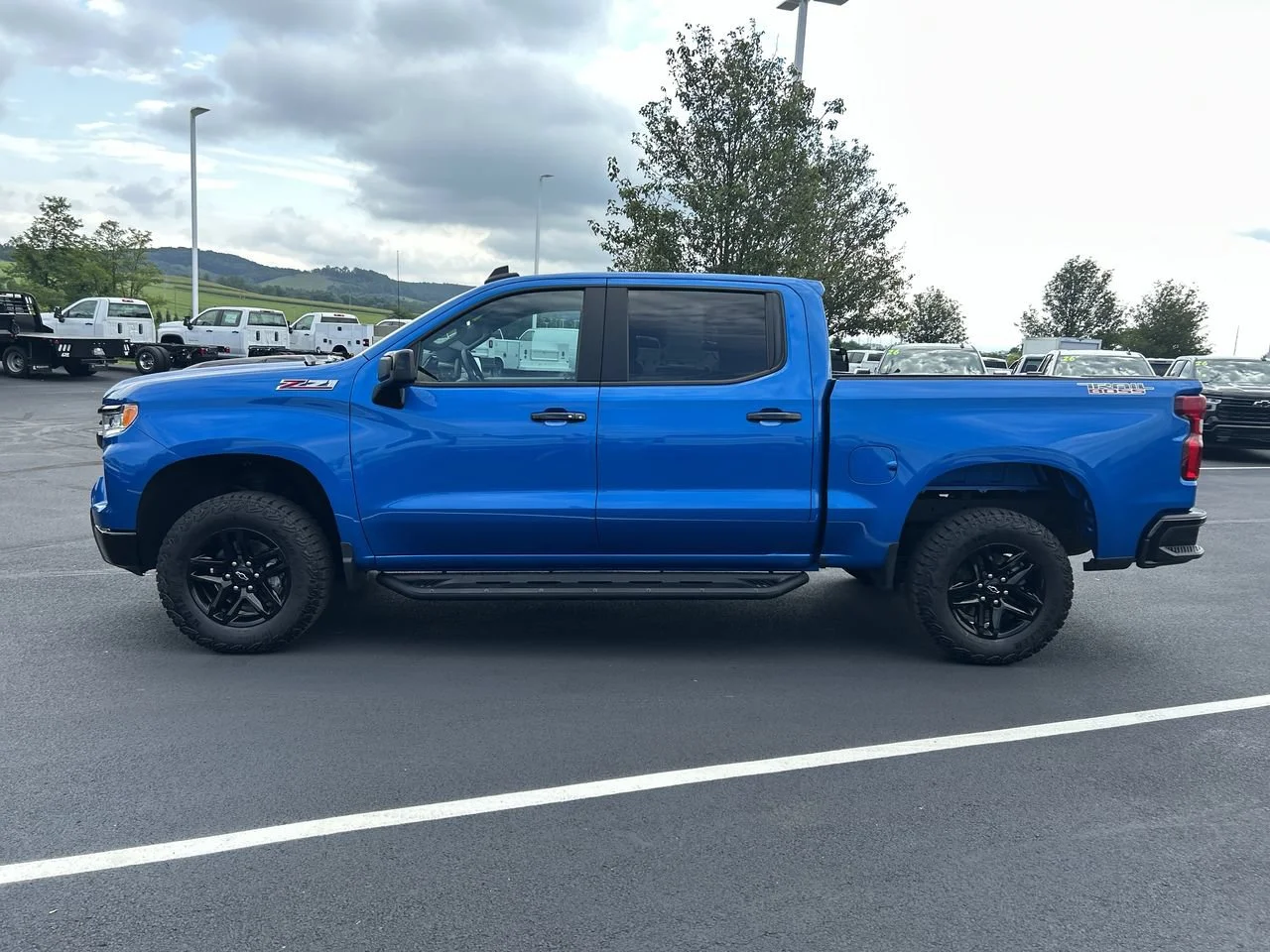 Used 2024 Glacier Blue Metallic Chevrolet LT Trail Boss image 4