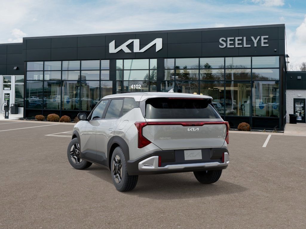 New 2027 Ivory Silver Kia LX image 4