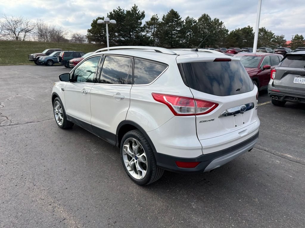 Used 2014 Ford Escape Titanium with VIN 1FMCU0JX2EUA76375 for sale in Brighton, MI