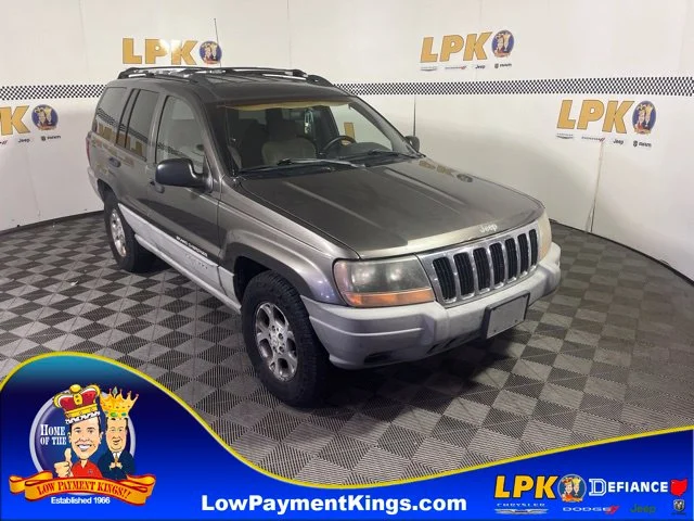 Used 1999 Taupe Frost Metallic Clear Coat Jeep Laredo image 1