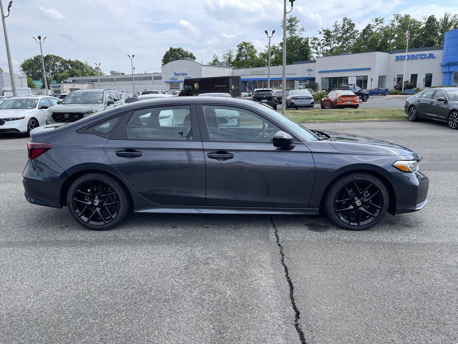 Used 2025 Meteorite Gray Metallic Honda Sport image 18