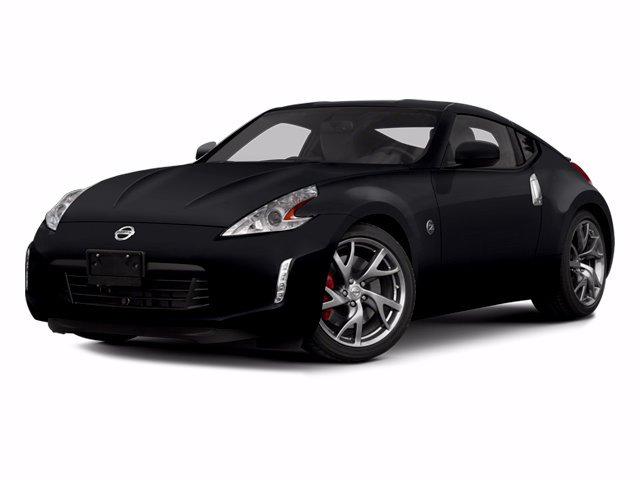Used 2014 Magnetic Black Metallic Nissan Base image 1