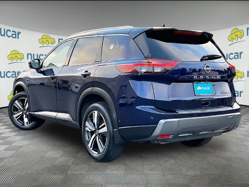Used 2024 Deep Ocean Blue Pearl/Super Black Nissan SL image 4