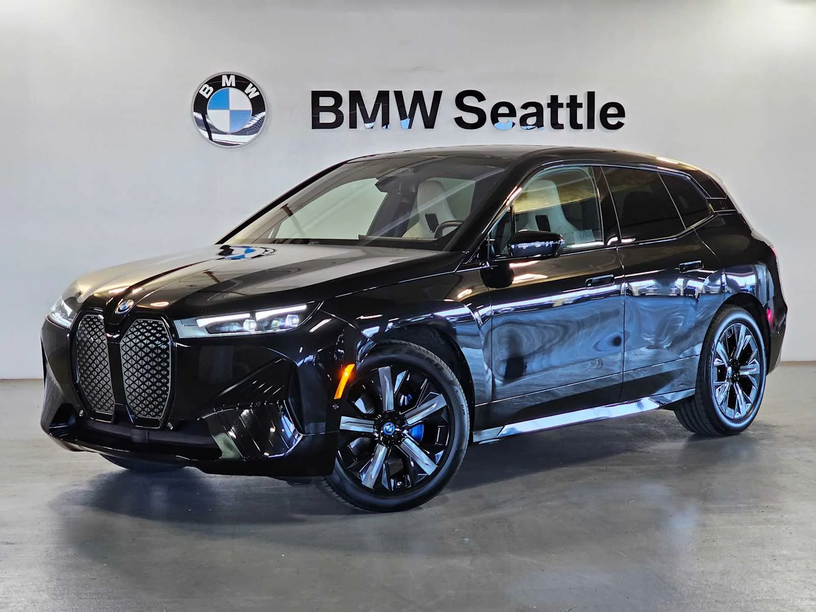 Certified Used 2024 Black Sapphire Metallic BMW xDrive50 image 1