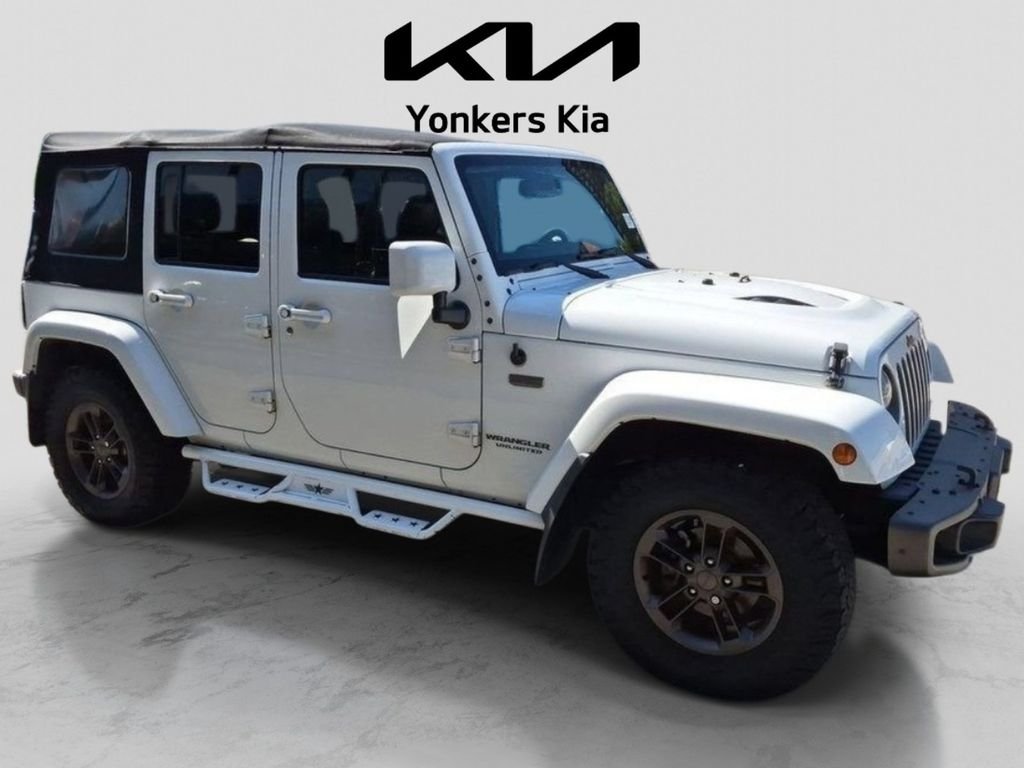 Used 2016 White Jeep Unlimited Sahara image 4