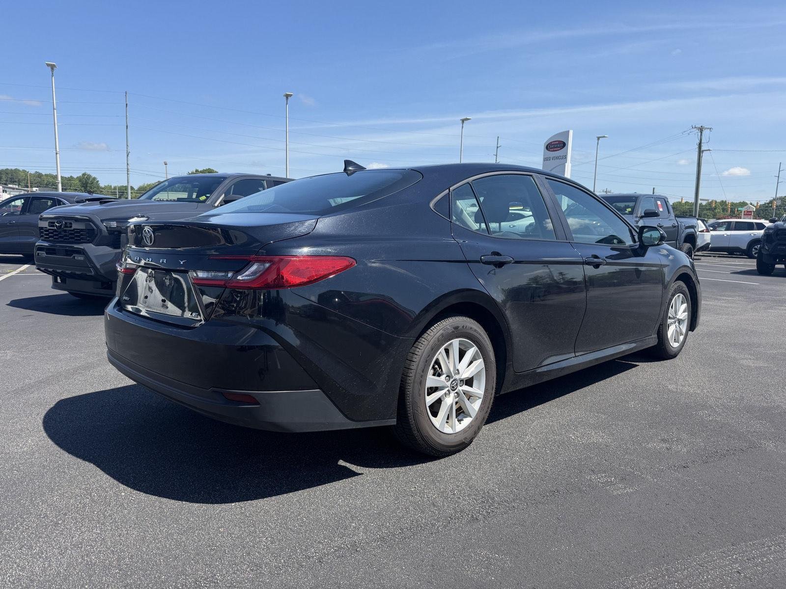 Used 2025 Midnight Black Metallic Toyota LE image 7