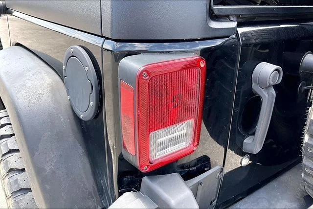 Used 2013 Black Jeep Unlimited Sport image 22