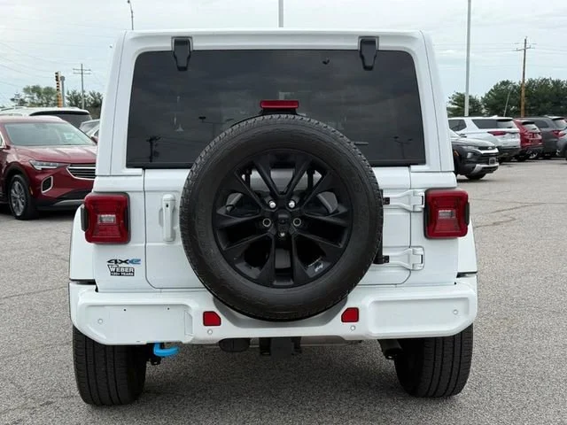 Used 2021 White Jeep Unlimited High Altitude 4x4 image 4