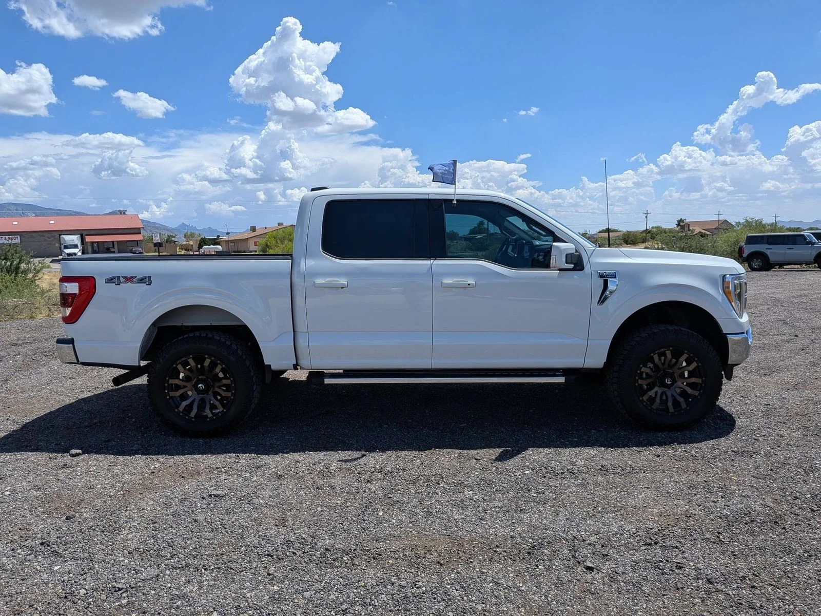 Certified Used 2022 White Metallic Ford Lariat image 4