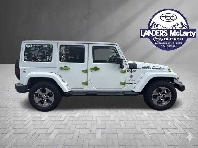 Used 2016 White Jeep Unlimited Sahara image 6