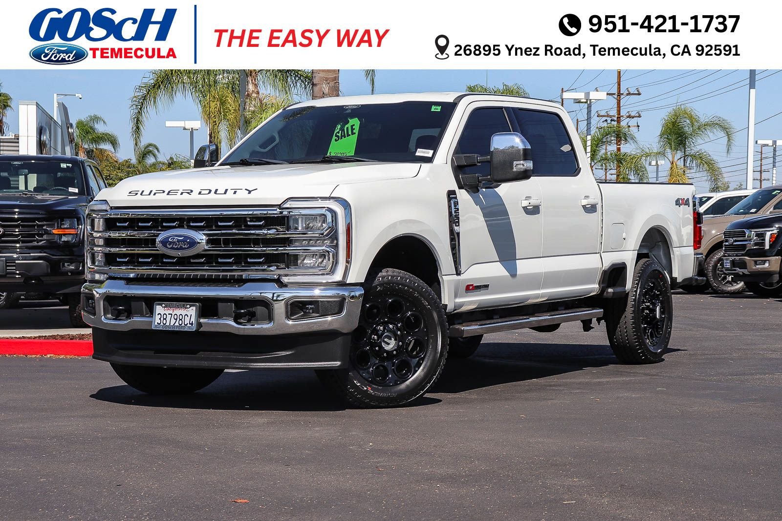 Certified Used 2024 White Metallic Ford Lariat image 1
