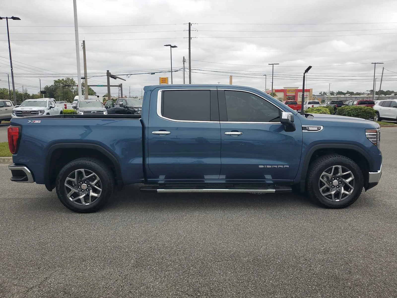 Used 2024 Downpour Metallic GMC SLT image 7