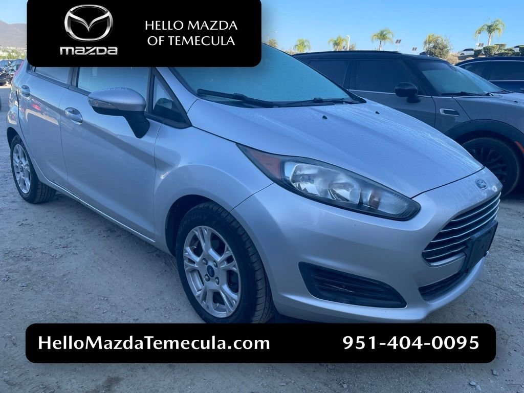 Used 2014 Ingot Silver Ford SE image 1